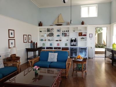 Living room with sofas and wooden furniture at Pavilion Hotel, one of the Catalina Island hotels on the beach