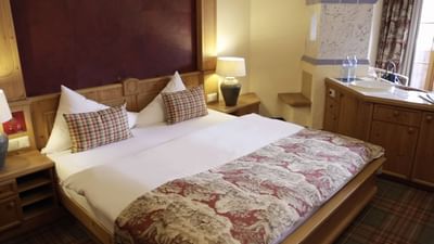 King bed in Premium Superior Double Room at Liebes Rot Flueh