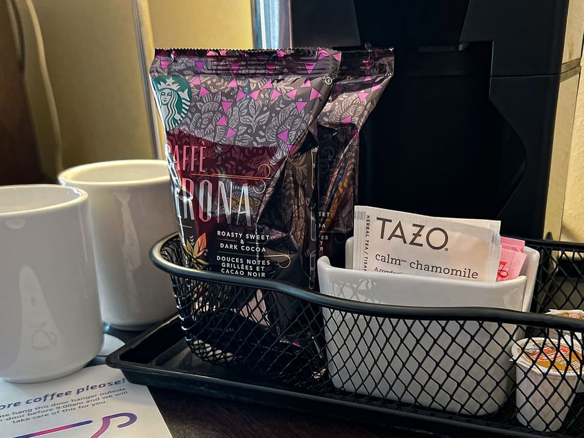 Tea, coffee, mugs, and coffee machine