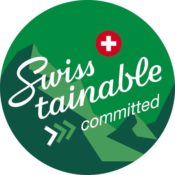 Swisstainable committed logo used at Warwick Geneva