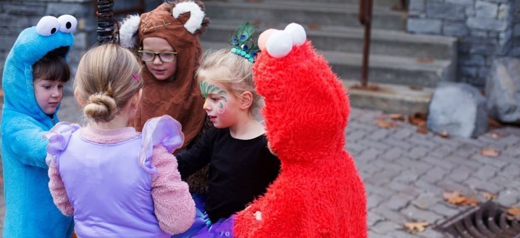 Costumed children trick-or-treat in Whistler Village