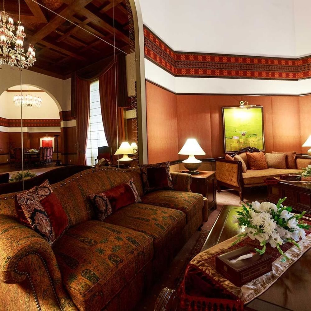 Elegant living room with ornate furniture and chandelier at Islamabad Serena Hotel in Islamabad.