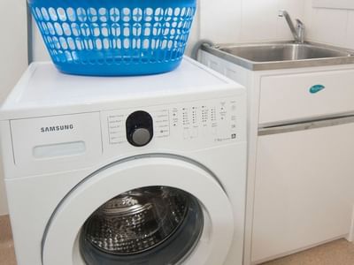 Samsung washing machine with blue basket on top at La Trobe University Regional Housing Shepparton.