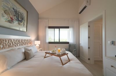 Breakfast served on king bed in Master Suite at Club Hemingway