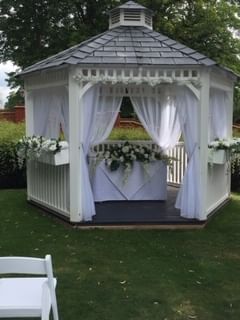 Gazebo with window boxes at Orsett Hall Hotel