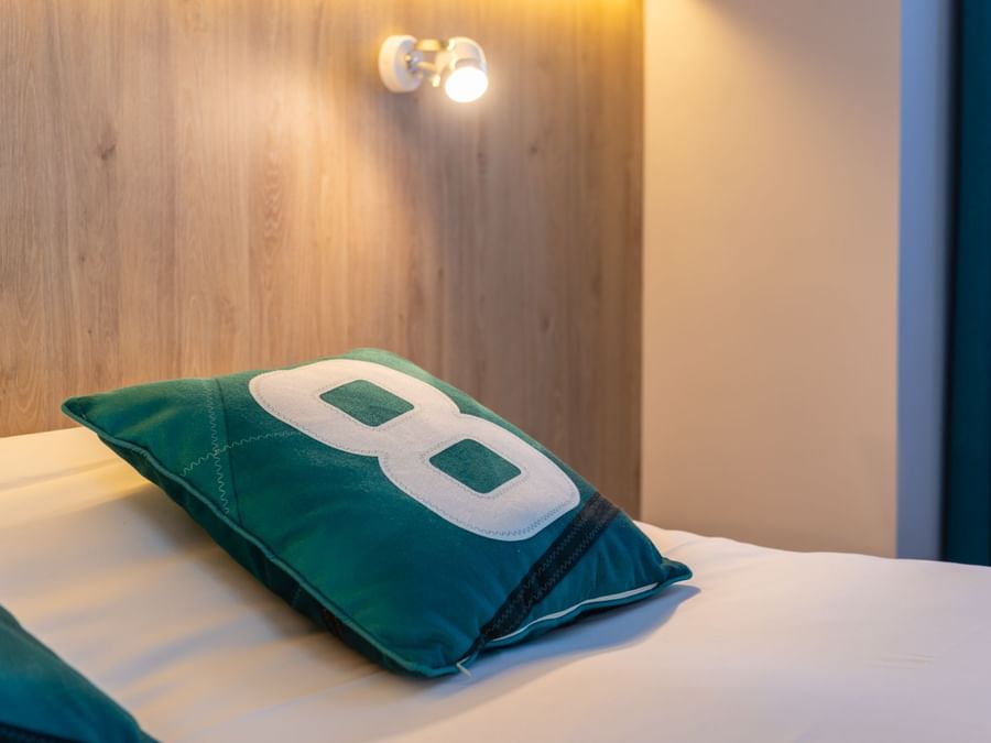 Closeup of a bed soft  pillow at Hotel des marins