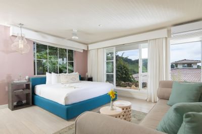 Room arranged with a large bed and sofa at Retreat Costa Rica