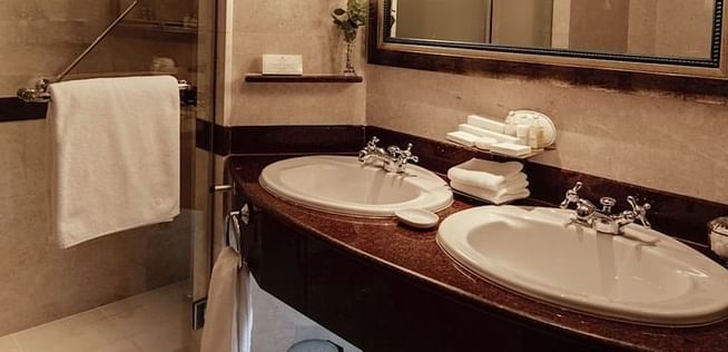 Bathroom vanity in Businessman Suite at Kamrrrrrrrrpala Serena Hotel
