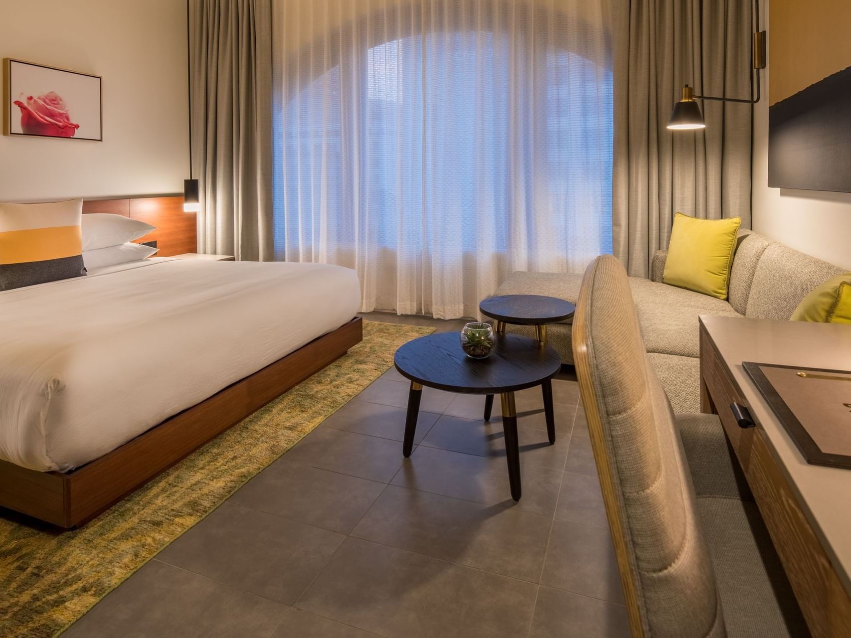 Hi-Lo hotel room with bed and sofa
