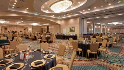 banquet hall with decorated tables and chairs