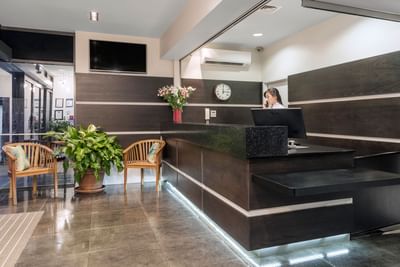 Female receptionist at St.Martine's at Nesuto Hotels