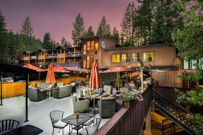 Outdoor dining area in twilight at Granlibakken Tahoe