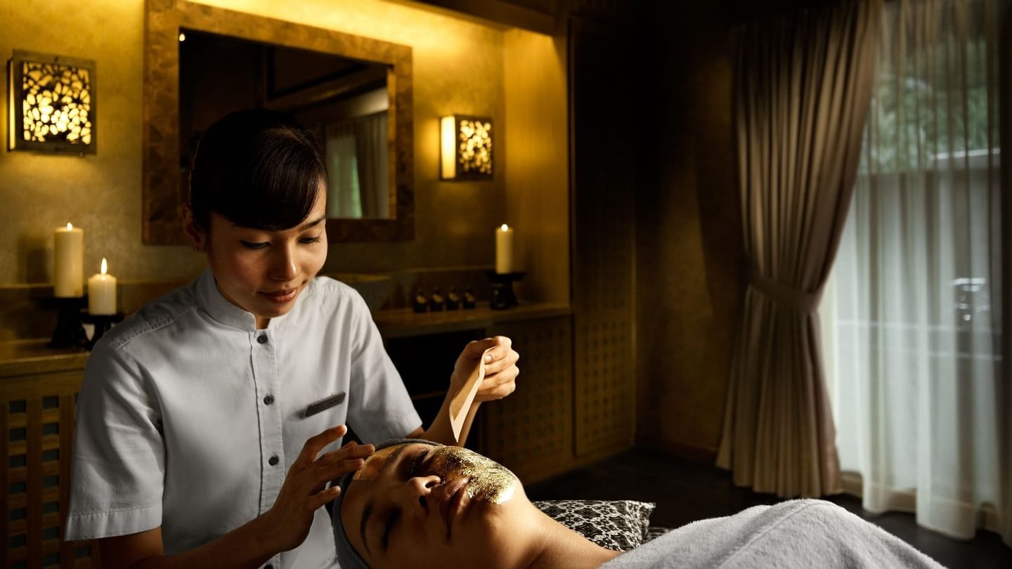 Lady getting a facial treatment in the Wellness spa at The Banjaran Hotsprings Retreat