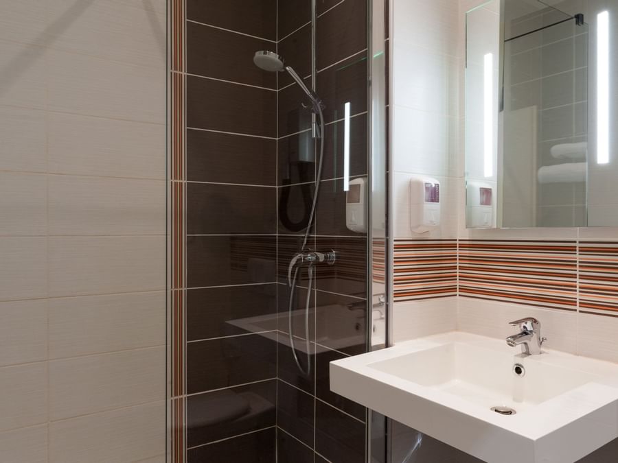 Bathroom vanity in bedrooms at Hotel Continental