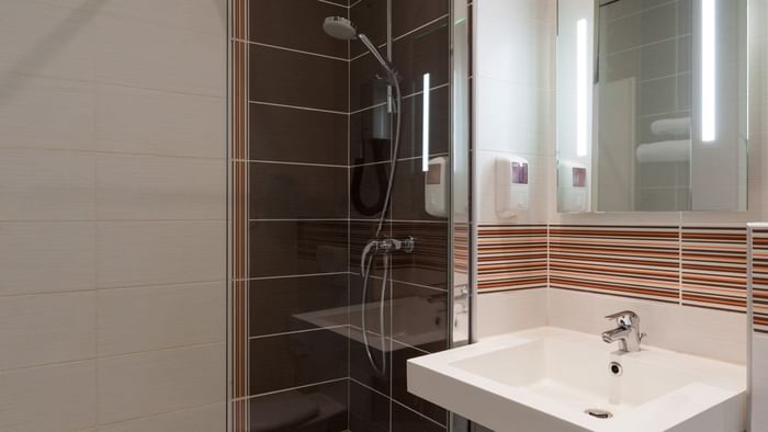 Bathroom vanity in bedrooms at Hotel Continental