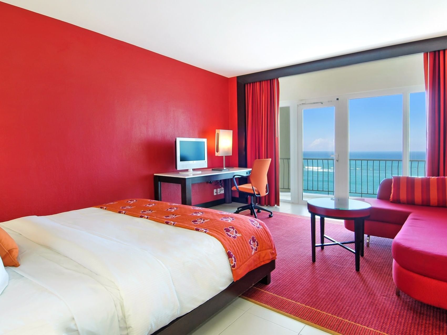 Oceanfront Room with a King bed & furniture at Condado Plaza