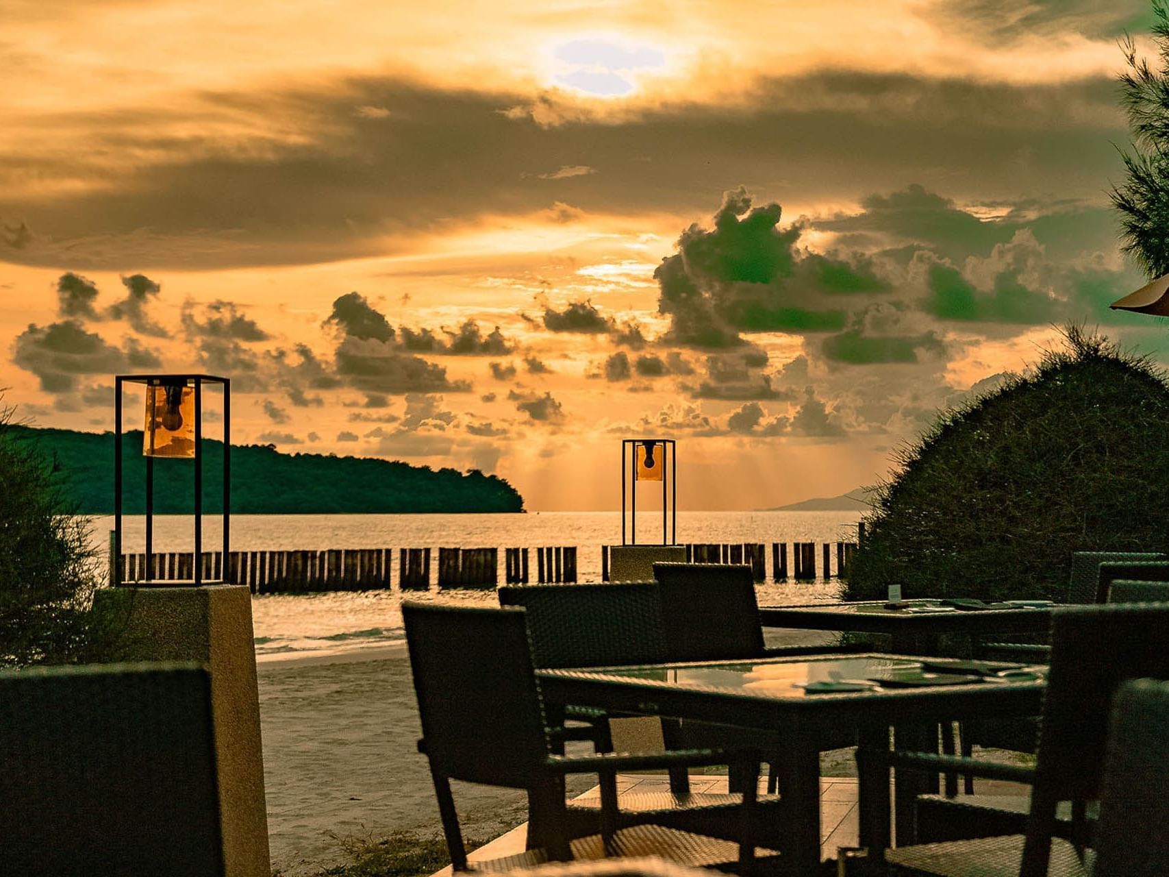 Outdoor table setting in Pelangi Grill at Pelangi Beach Resort