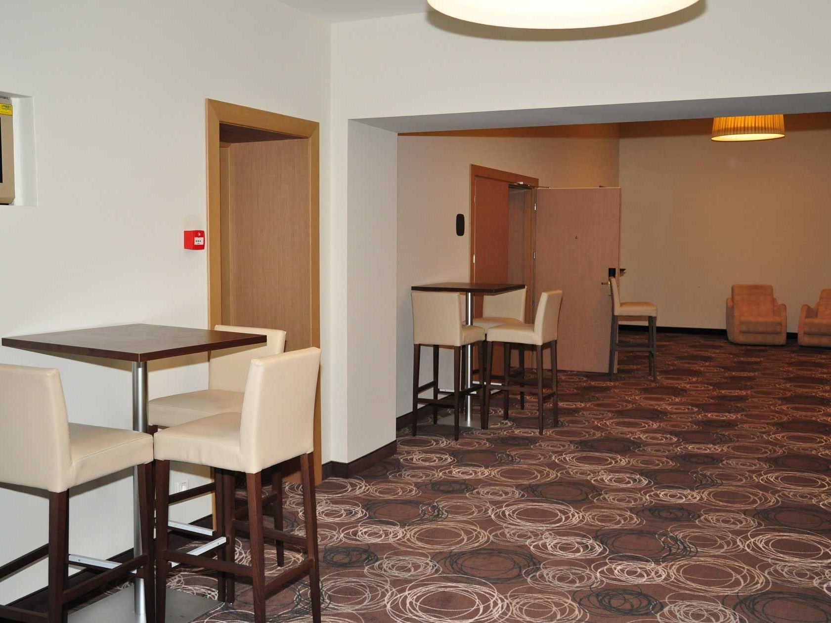 High chairs and hallway of The Foyer at Ana Hotels Sport