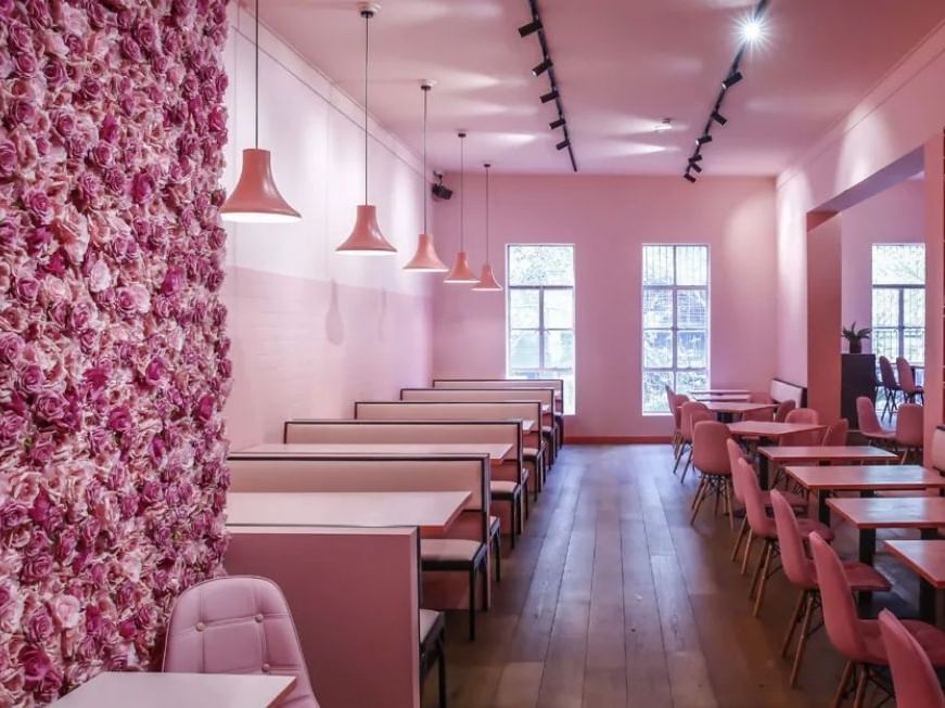 Dining area setup in Pink restaurant at Brady Hotels