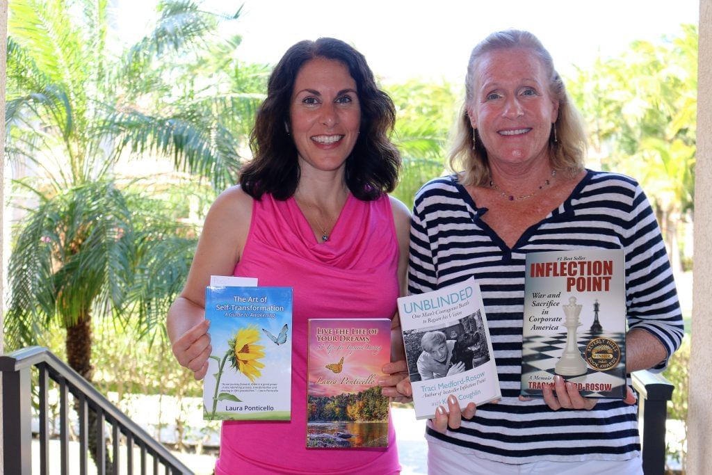 Two ladies posing for a picture at The Somerset On Grace Bay