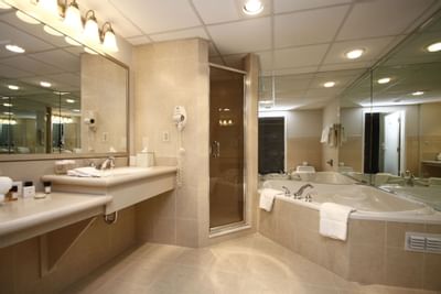 Shower & jacuzzi tub in VIP suite bathroom at Ethan Allen Hotel