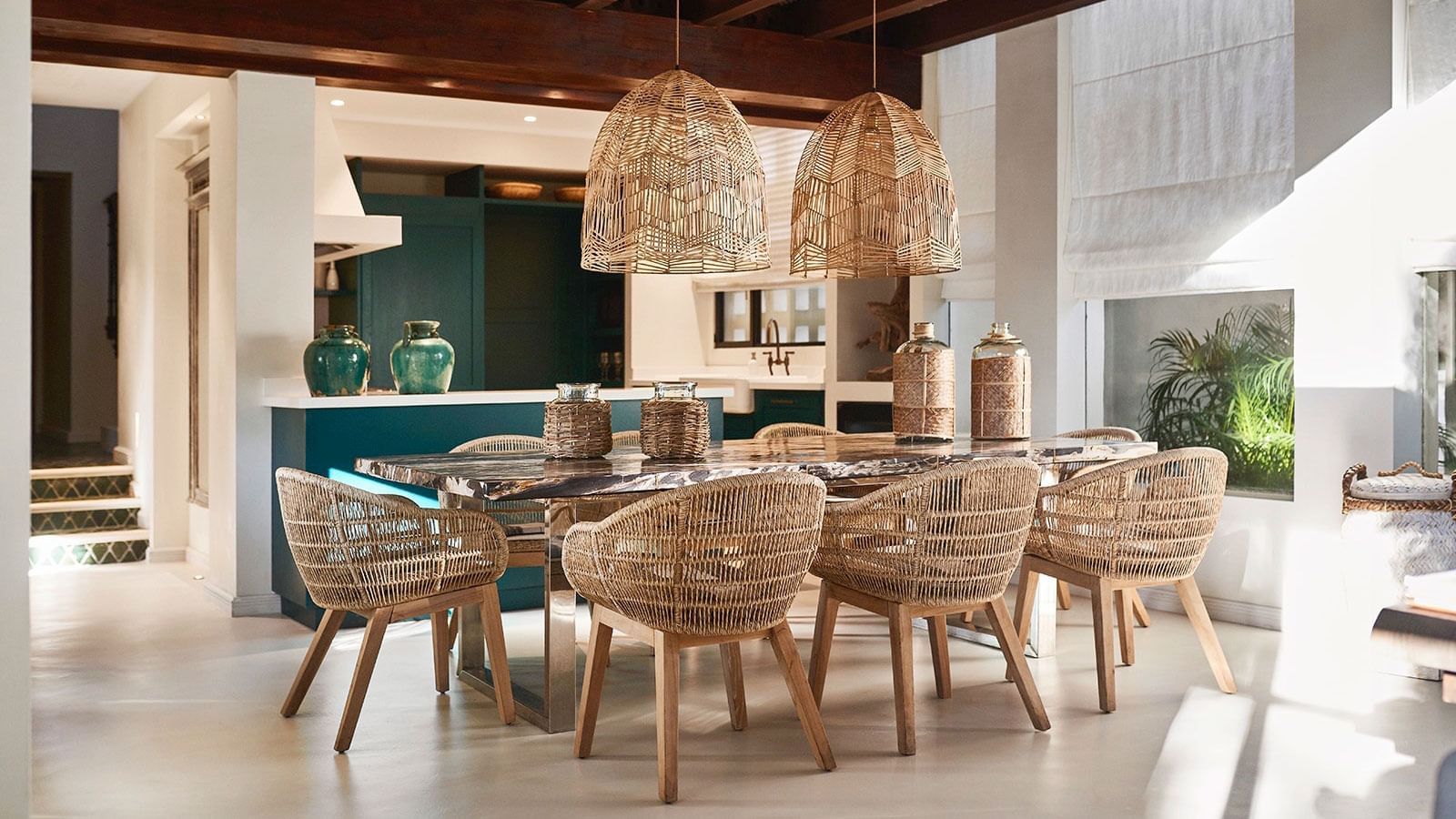 Dining area with Rattan chairs in Bel Air at Marbella Club
