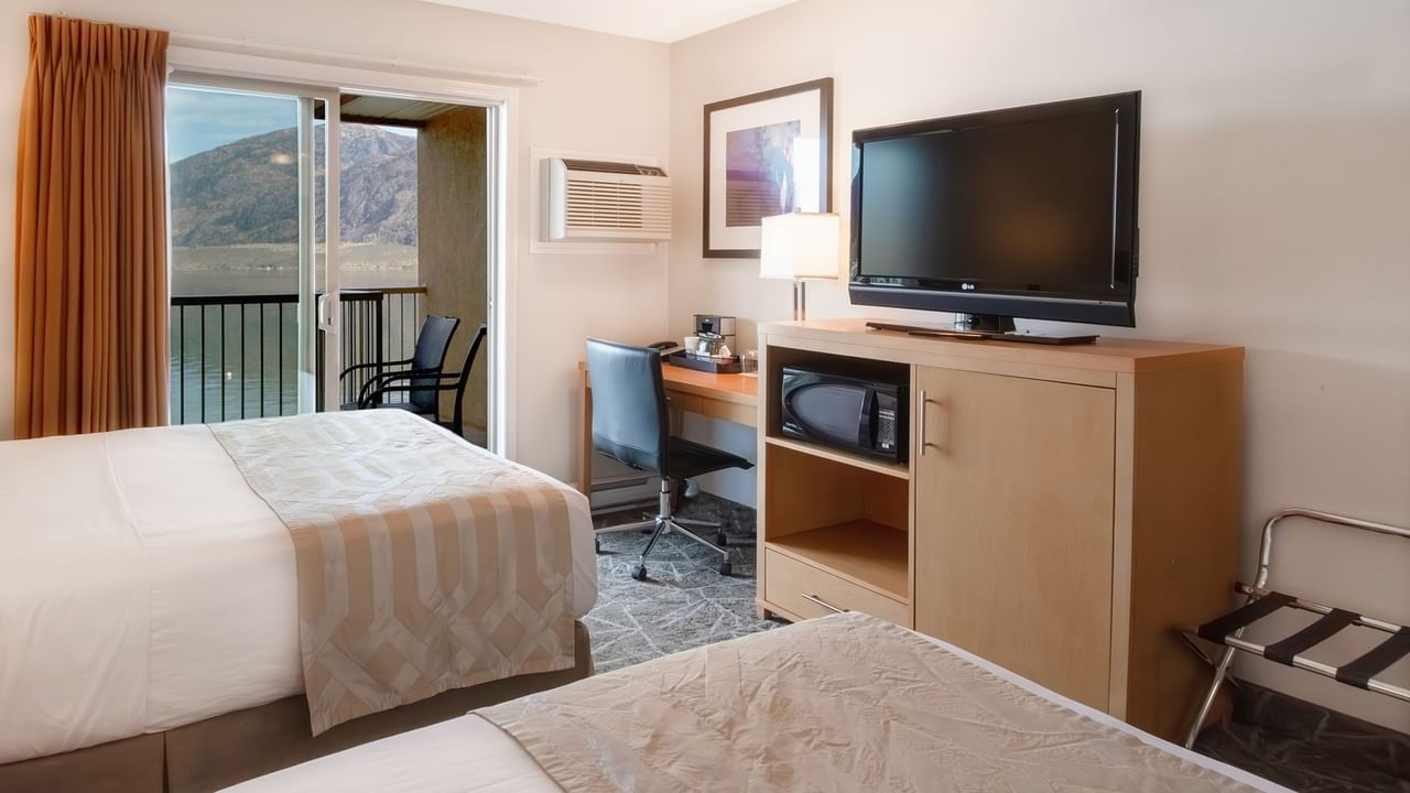 Room with a balcony view and TV
