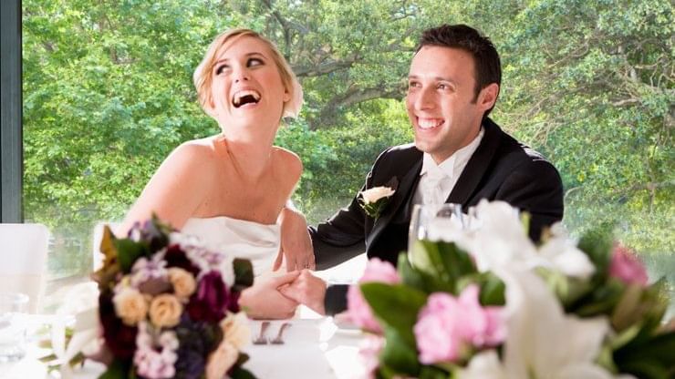 A wedding couple smiling at Pullman Sydney Hyde Park