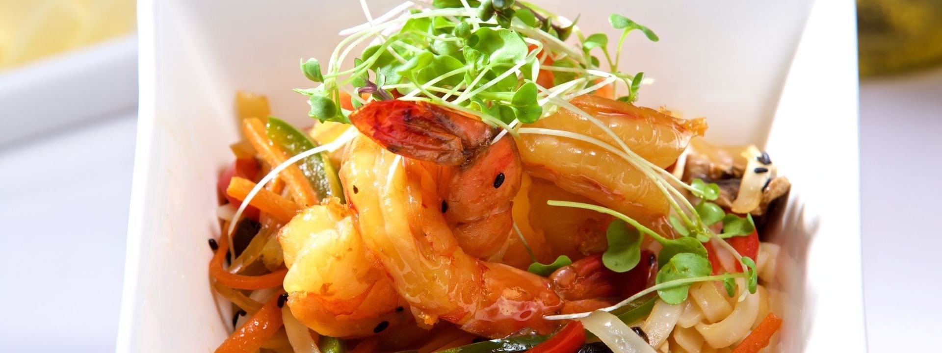 Grilled shrimp with peppers under microgreens in Tings on a Stick at Warwick Paradise Island Bahamas