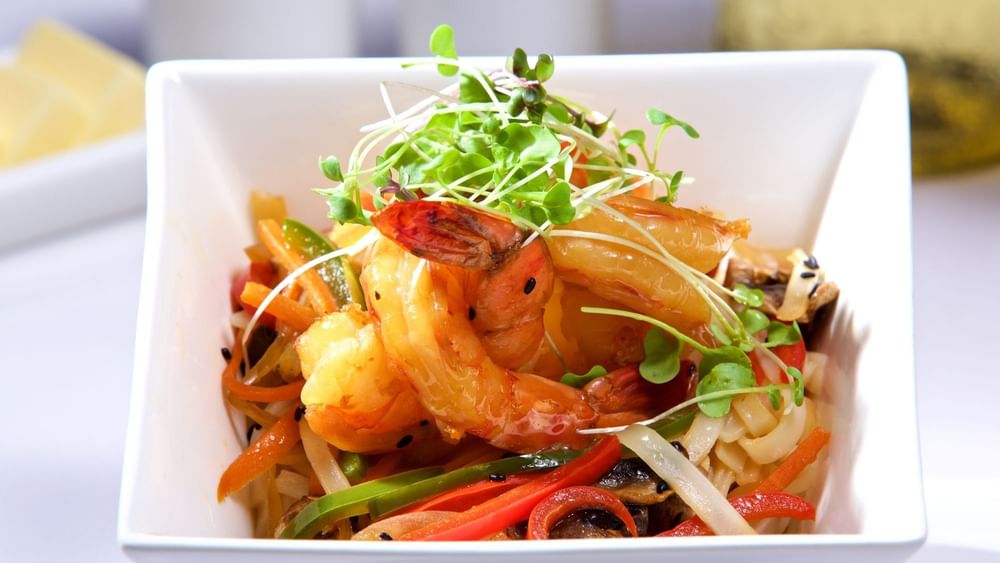 Grilled shrimp with peppers under microgreens in Tings on a Stick at Warwick Paradise Island Bahamas