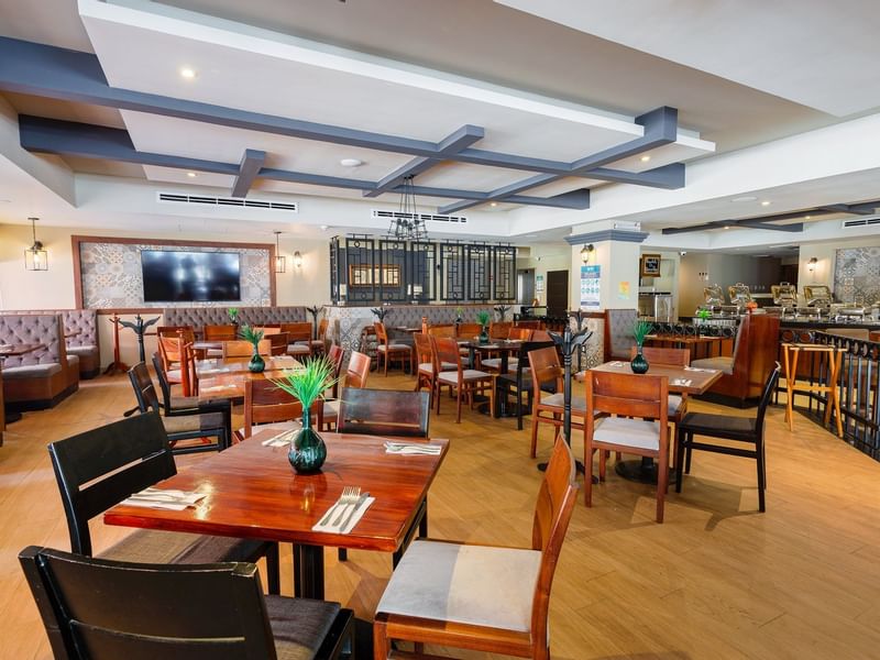 Dining tables set-up in Restaurante Papagayo at Gamma Hotels