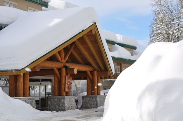 Snow covered entrance to Coast Hillcrest Hotel in Revelstoke