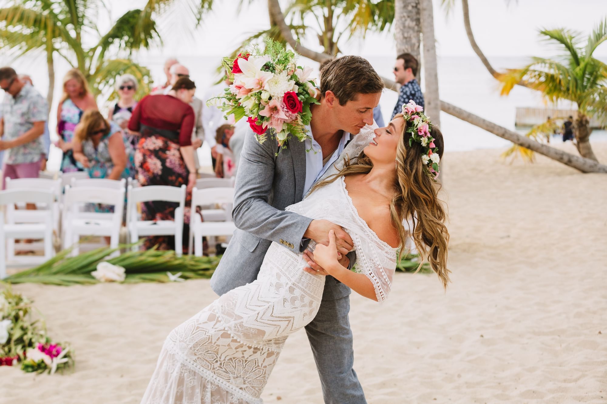 Wedded couple dancing on the beach at The Buccaneer Resort St. Croix