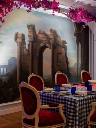 Dining table & mural in Vanitas restaurant at Palazzo Versace 