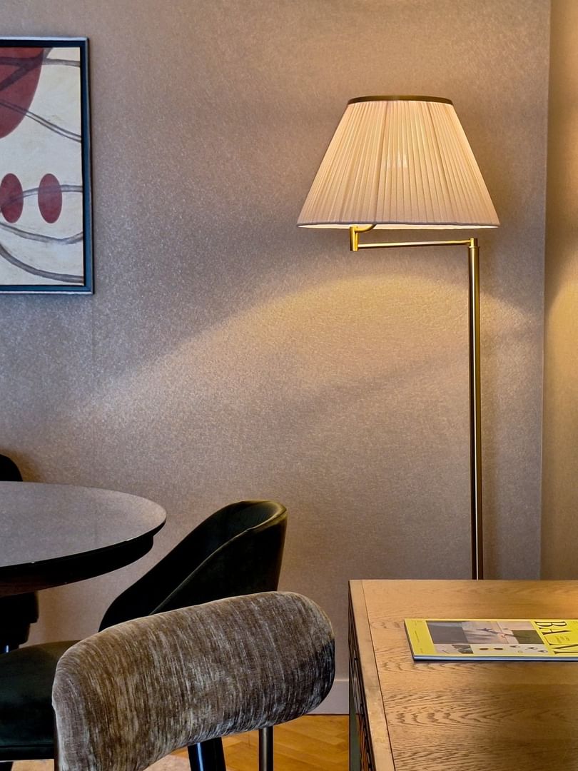 Work desk and dining table in Premium Suite with wooden floors at Warwick Reine Astrid - Lyon