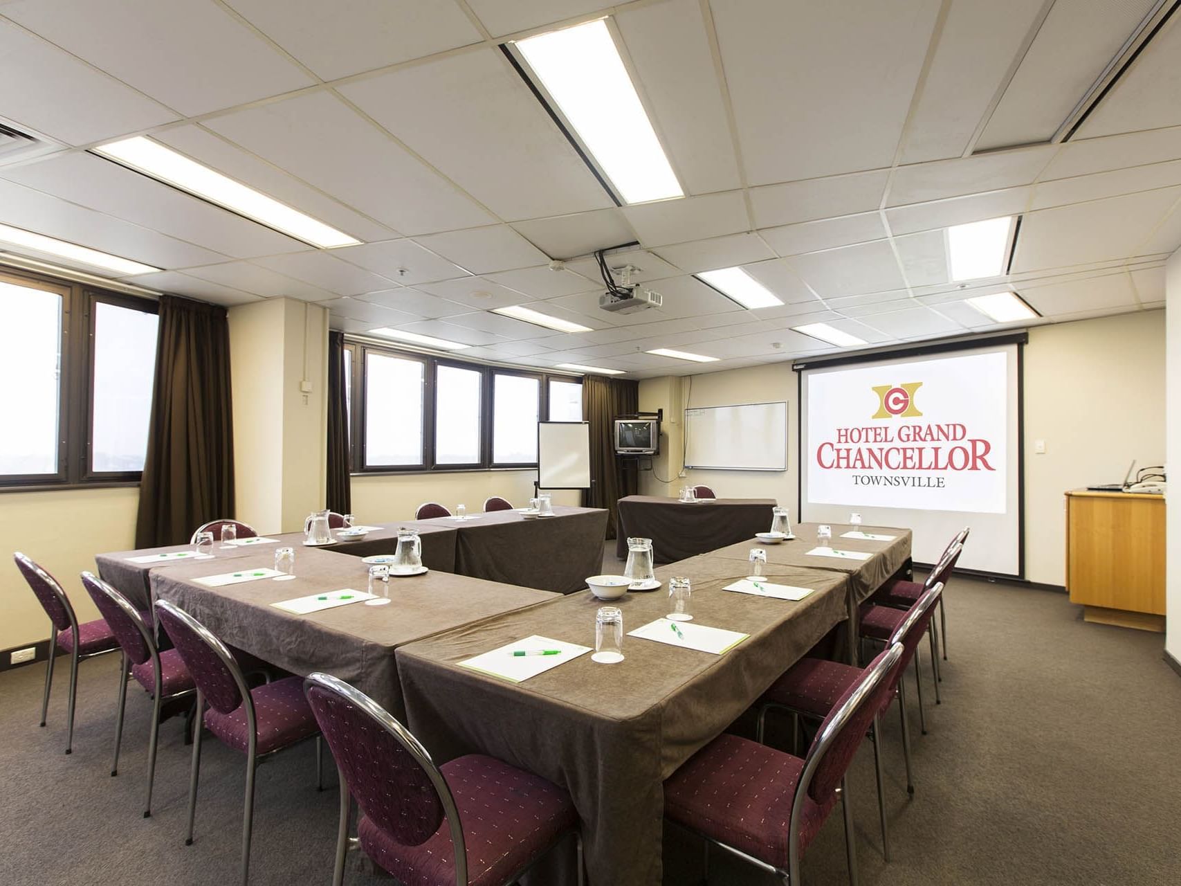 U-shaped meeting room set up in Ross Creek Room at Hotel Grand Chancellor Townsville