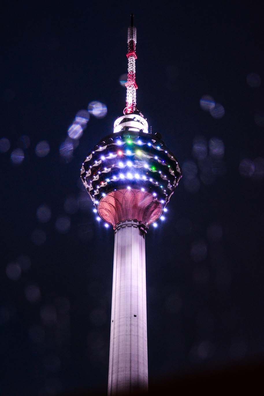 Low-angle view of KL Tower at night at Sunway Resort