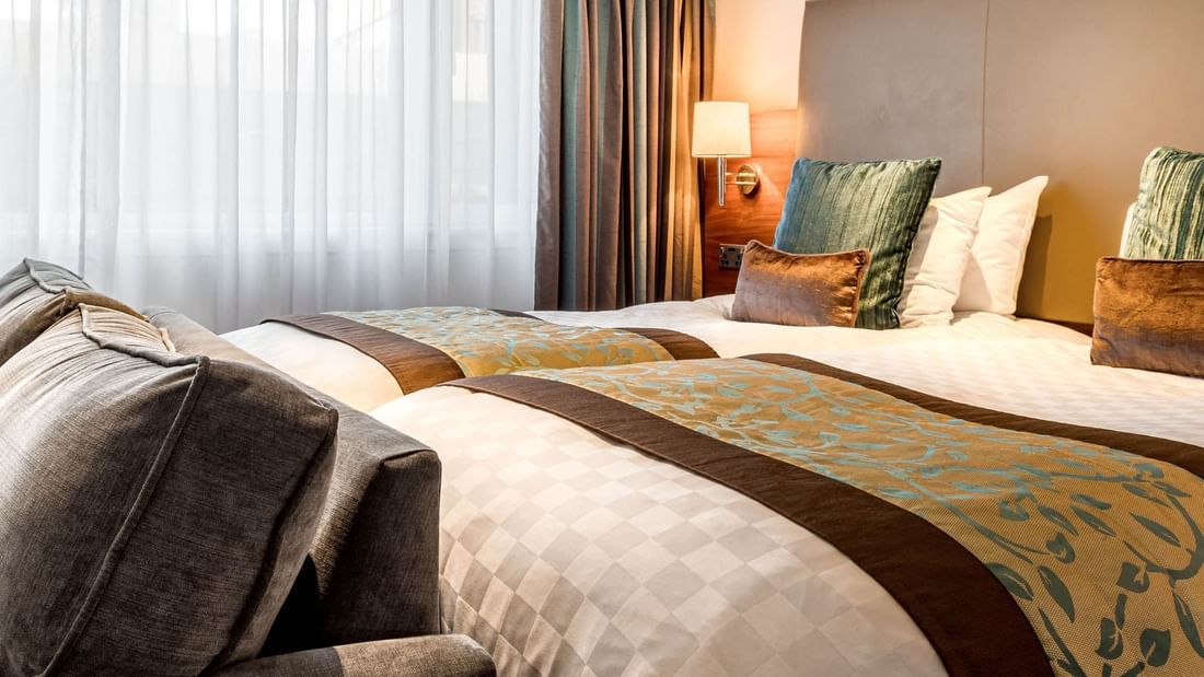 Double bed in Executive Twin Room at Clermont Hotel Group