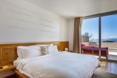 Nightstands by the bed in Superior Suites with terrace and a mountain view at The Terraces Resort & Spa