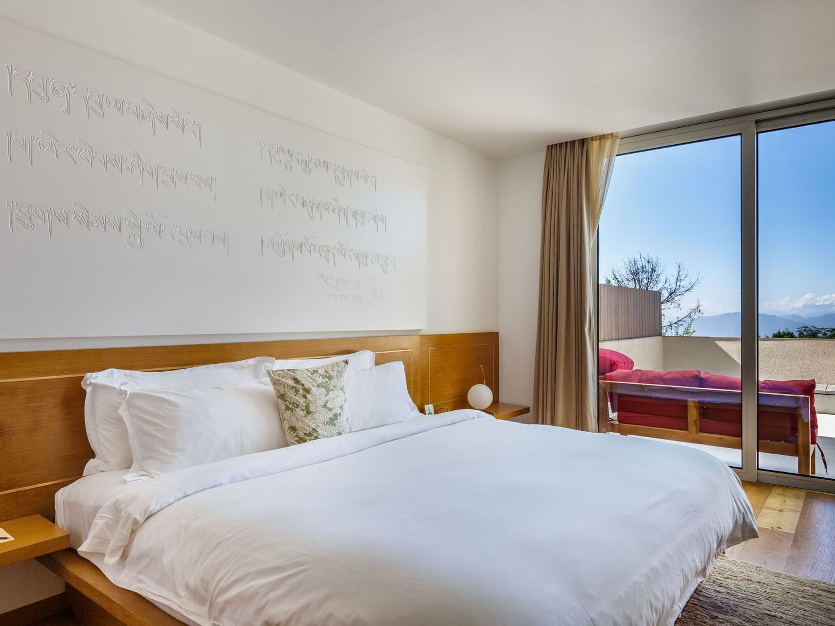 Nightstands by the bed in Superior Suites with terrace and a mountain view at The Terraces Resort & Spa