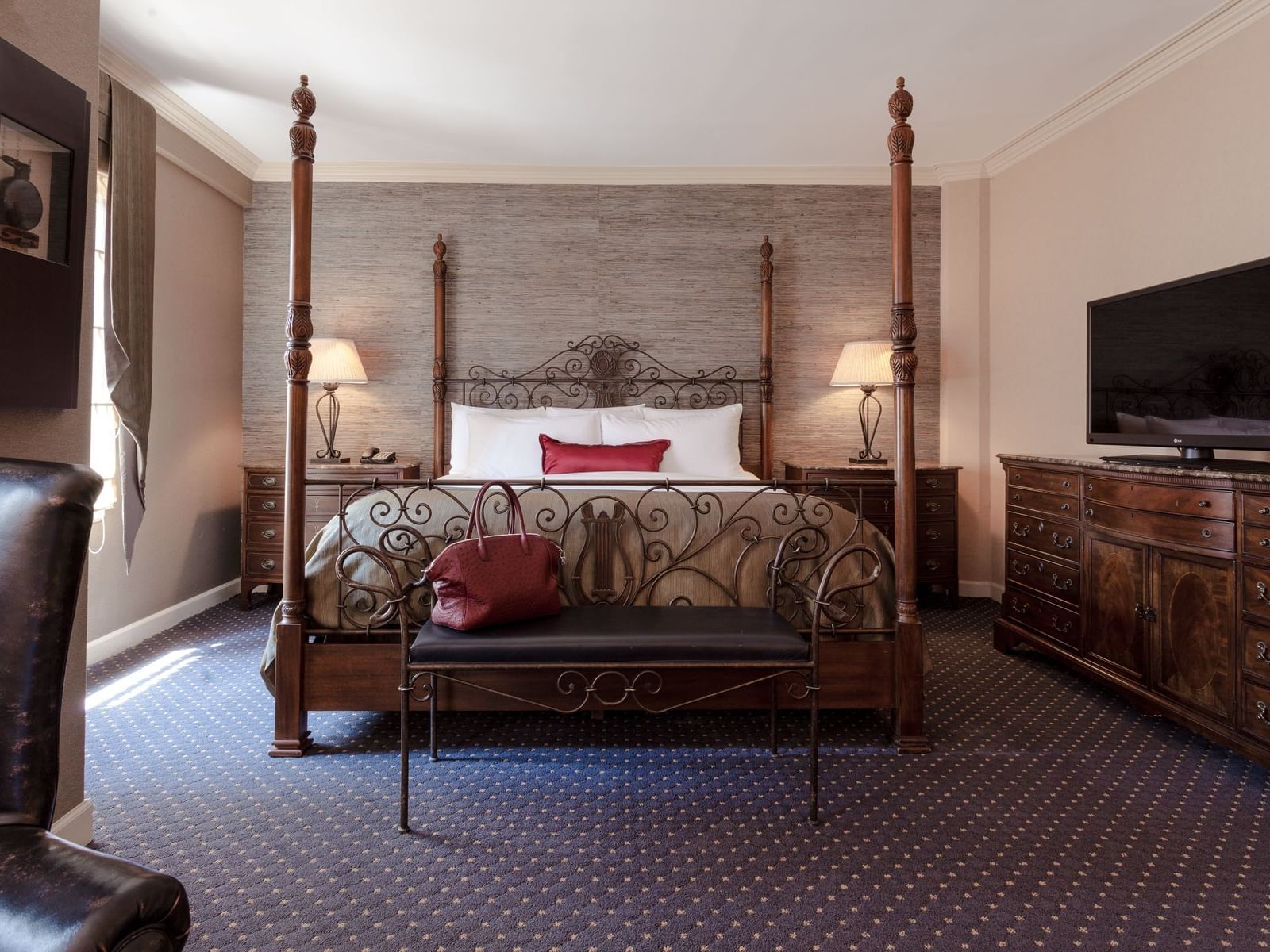 Junior Suite bedroom with a king bed at The Whitehall Hotel