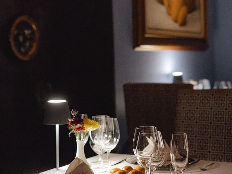 Table prepared for dining in Canto Del Mar restaurant at Marquis Los Cabos Resort
