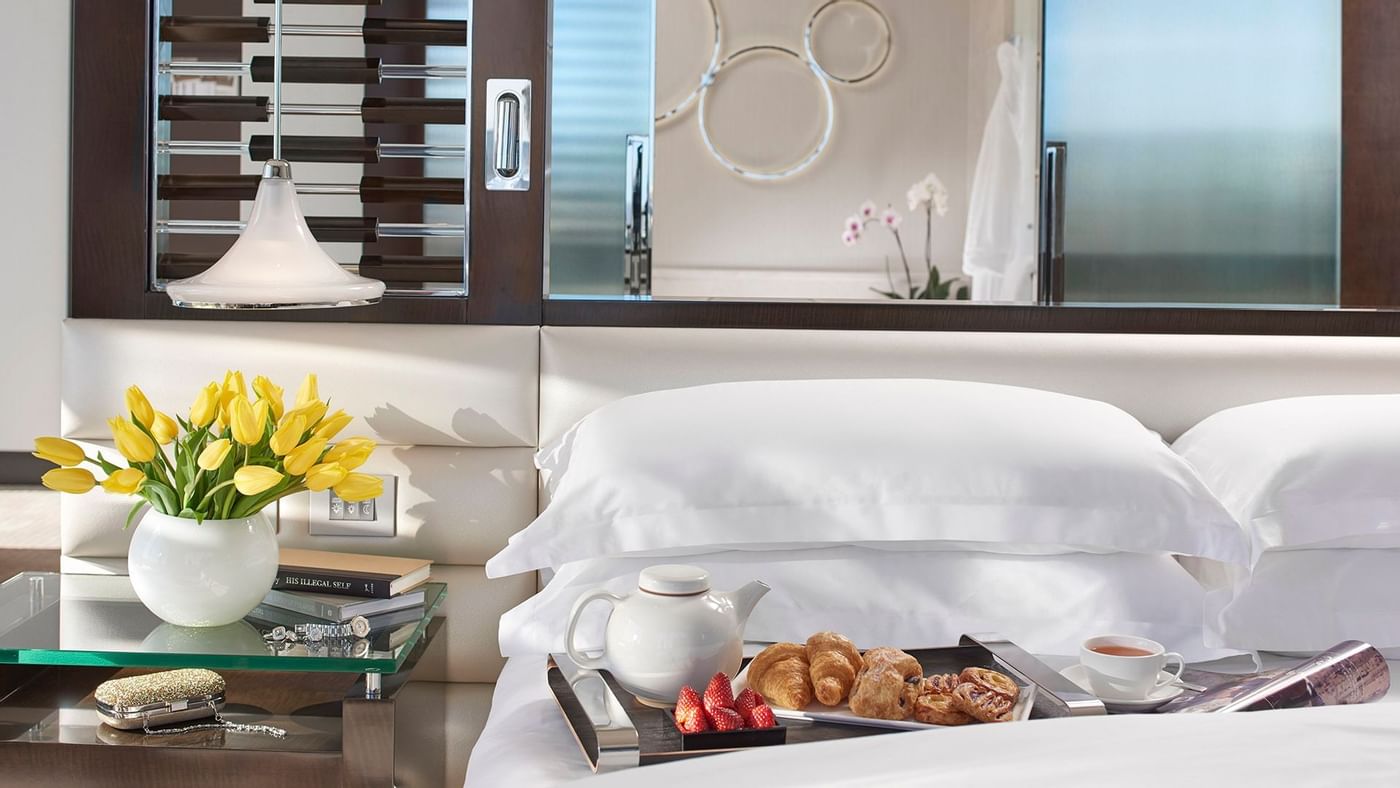 Closeup of a bed in a room at Crown Hotels