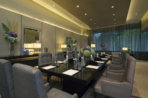 A table setup in a meeting room at Okura Prestige Bangkok