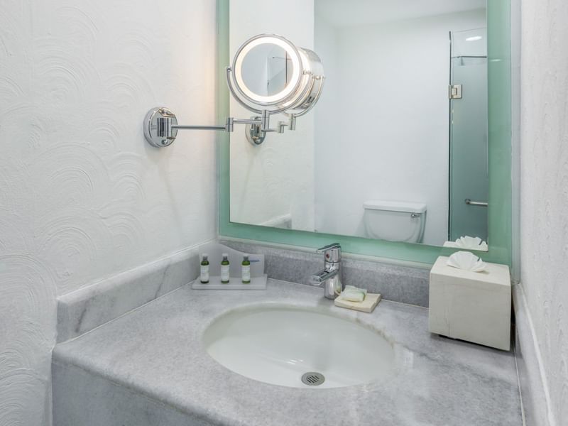 Bathroom vanity in Superior Room at Gamma Hotels