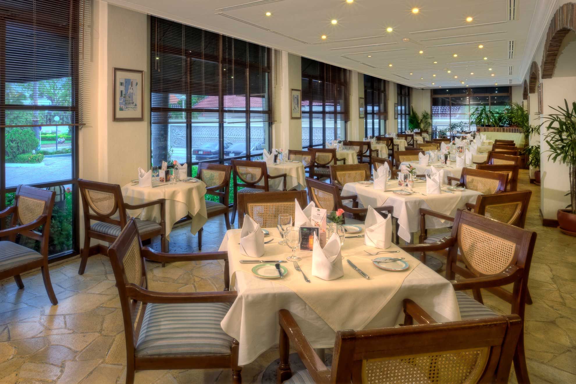 Dining tables arranged in Sun Cafe at Sunway Hotel Phnom Penh