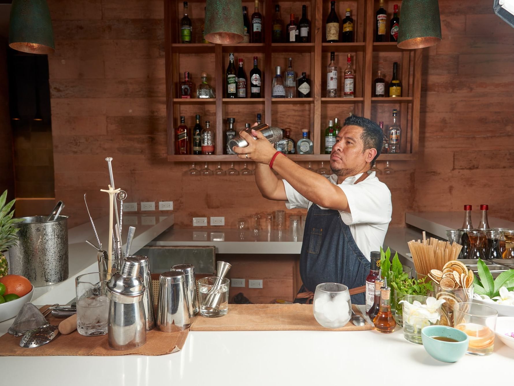Bartender making a cocktail at the Cuna Bar in Wayam Mundo Imperial