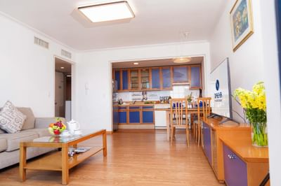 Living room with couch & kitchen are at Hanoi Daewoo Hotel