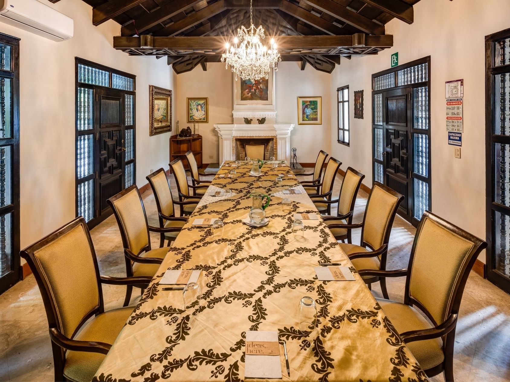 12 seater table & chandelier in The Dining Room at Pensativo House Hotel