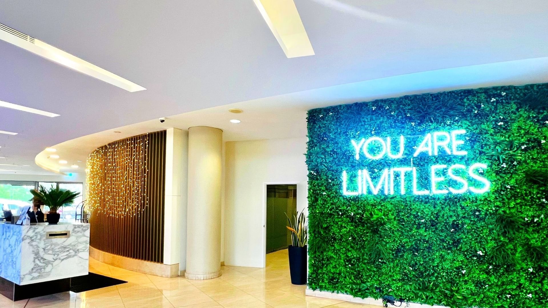 Front desk & light decor by the lobby at Novotel Olympic Park